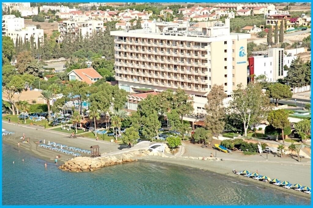 Отель Poseidonia Beach Hotel 4*