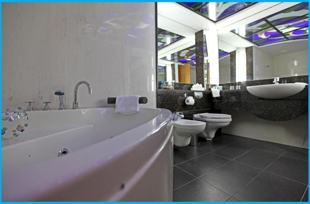 Фотография Poseidonia Beach Hotel 4*