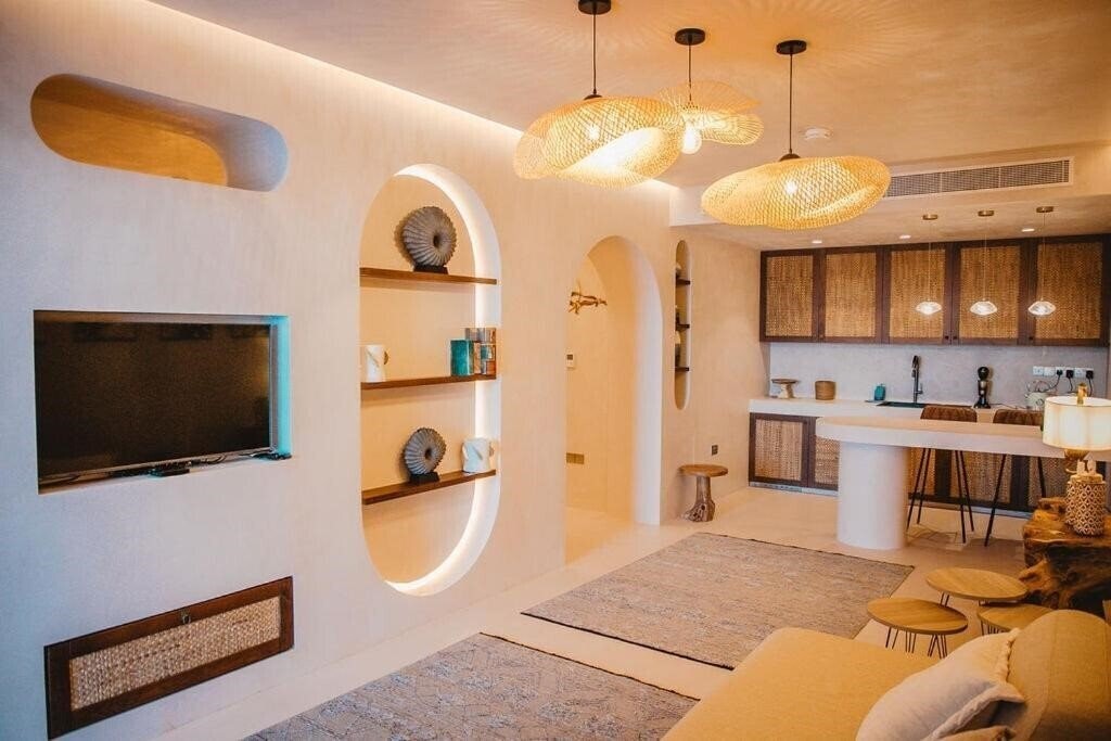 Фото Q Coconuts Seaside Suites (Adults Only) 4*