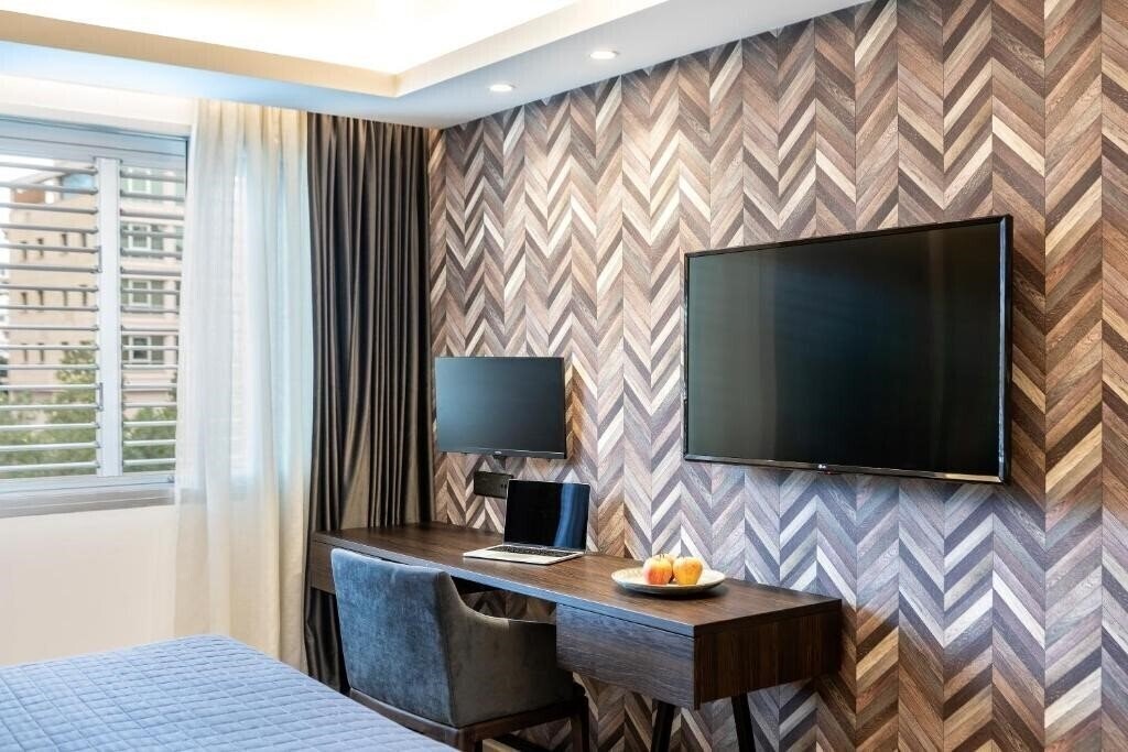 Фотография Almond Business Suites Apts Apts апартаменты