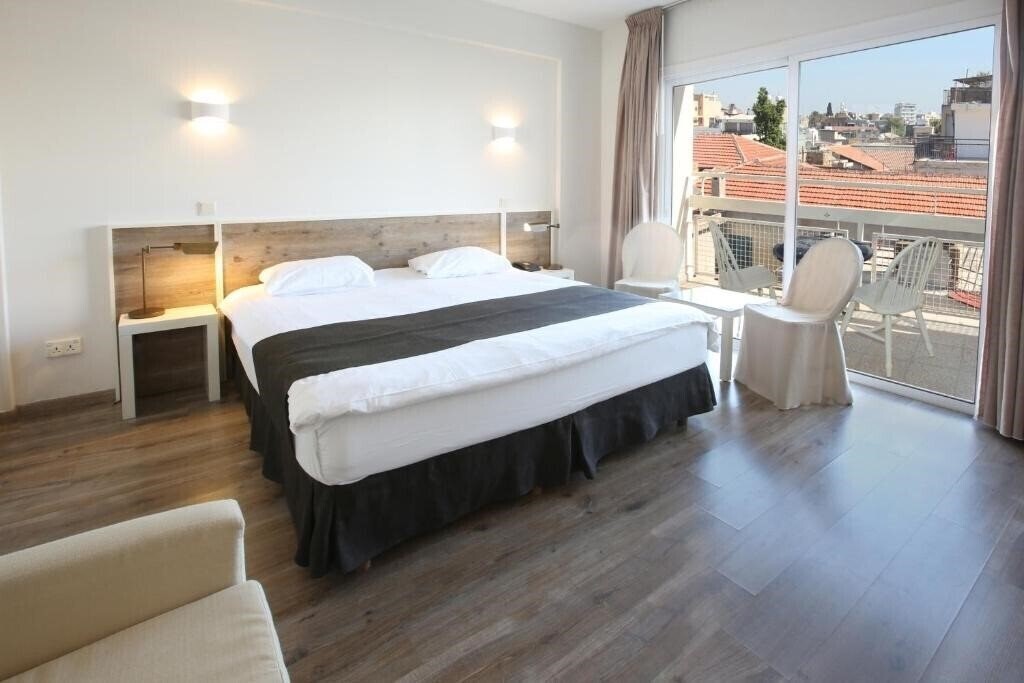 Готель Nicosia City Center Hotel 4*