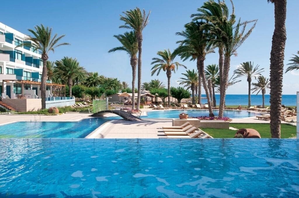 Фото Constantinou Bros Asimina Suites Hotel 5*