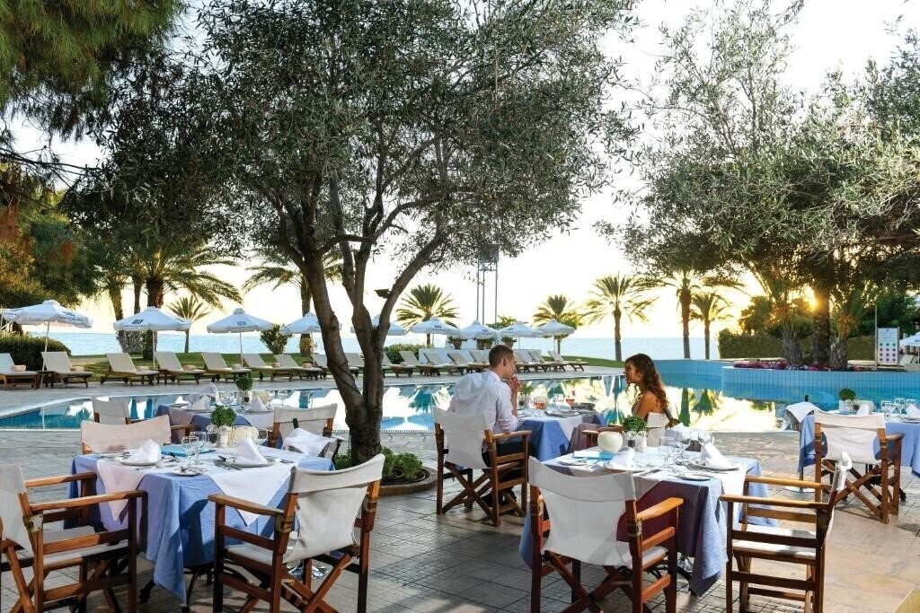 Изображение Constantinou Bros Athena Royal Beach Hotel 4*