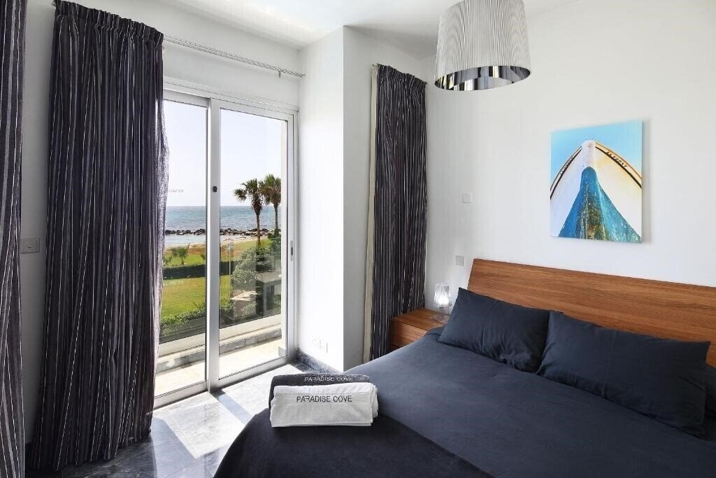 Фото Paradise Cove Luxurious Beach Villas 4*