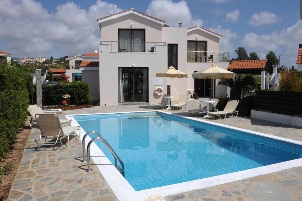 Фото Platzia Beach Villas 4*