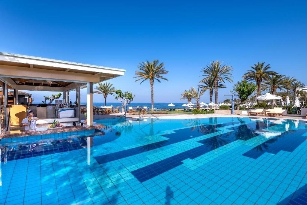 Фотография Constantinou Bros Athena Beach Hotel 4*