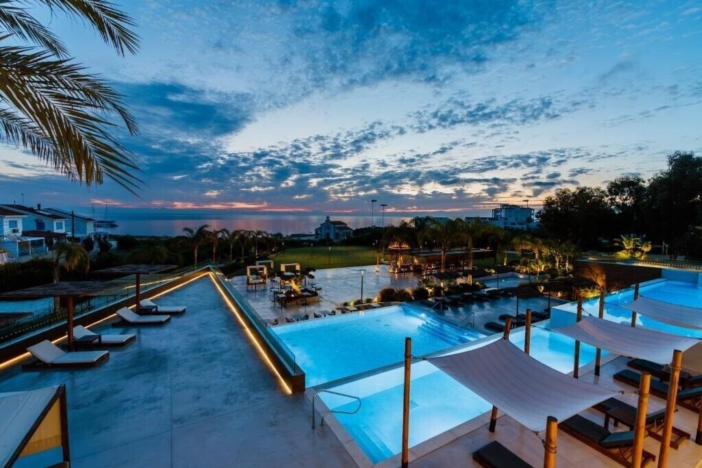 Отель Cavo Zoe Seaside (ex. Iris Splash Beach) 4*
