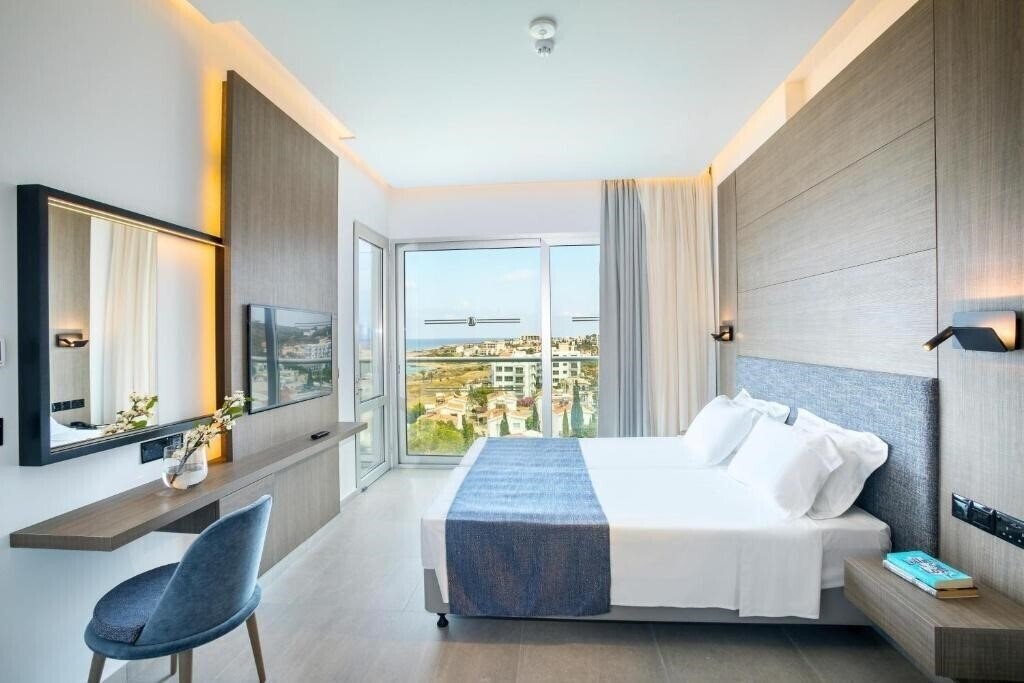 Фотографія Cavo Maris Beach Hotel 4*