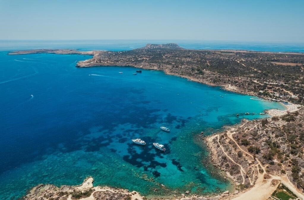 Отель Periyiali Konnos Villas Beach Resort 4*