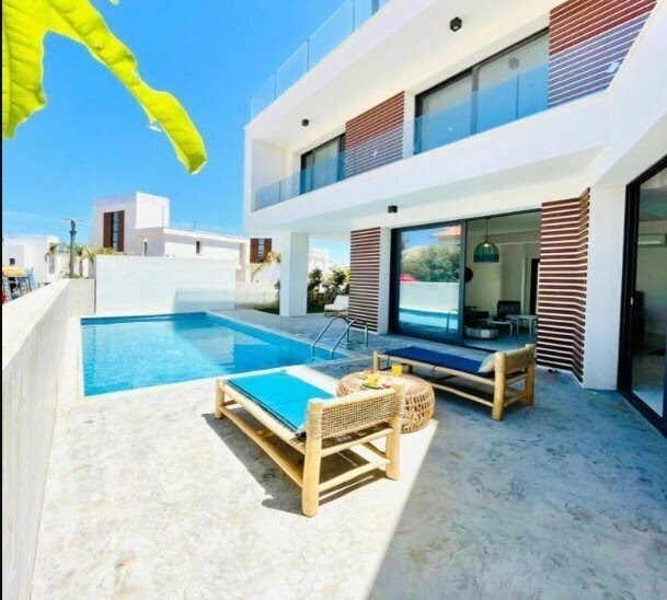 Отель By The Beach Villa 7 2*