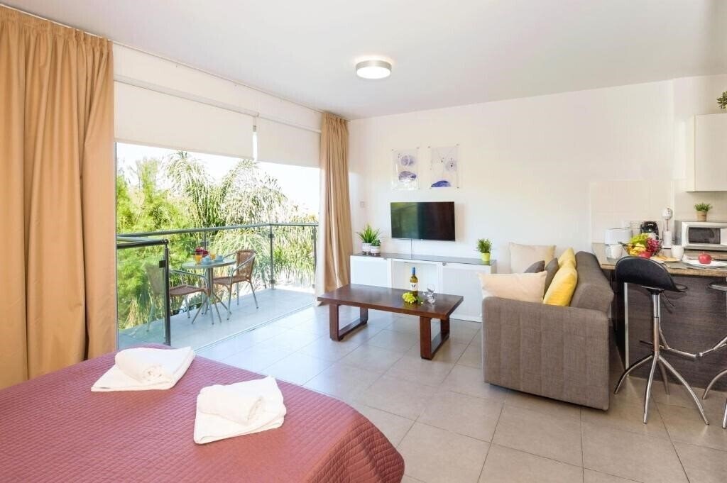 Фото Lucile - Coralli Beachfront Apartment 3*