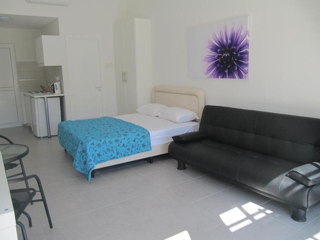 Фотография Sunny Holiday Apartments 3*
