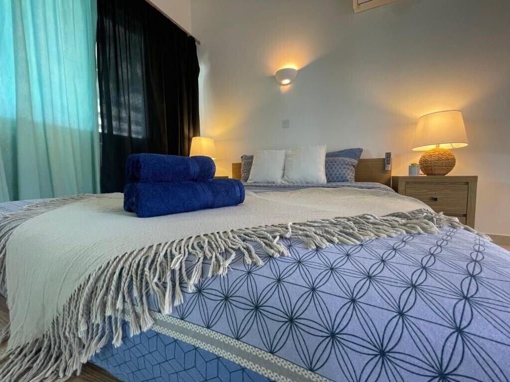 Фотографія Villa Cataleya Fig Tree Bay Protaras Town Center 3*