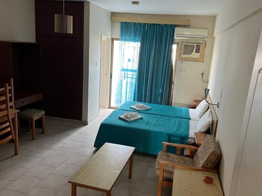 Фото Maouris Apartments апартаменты