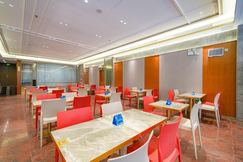 Фотографія Baiyun City Hotel 3*
