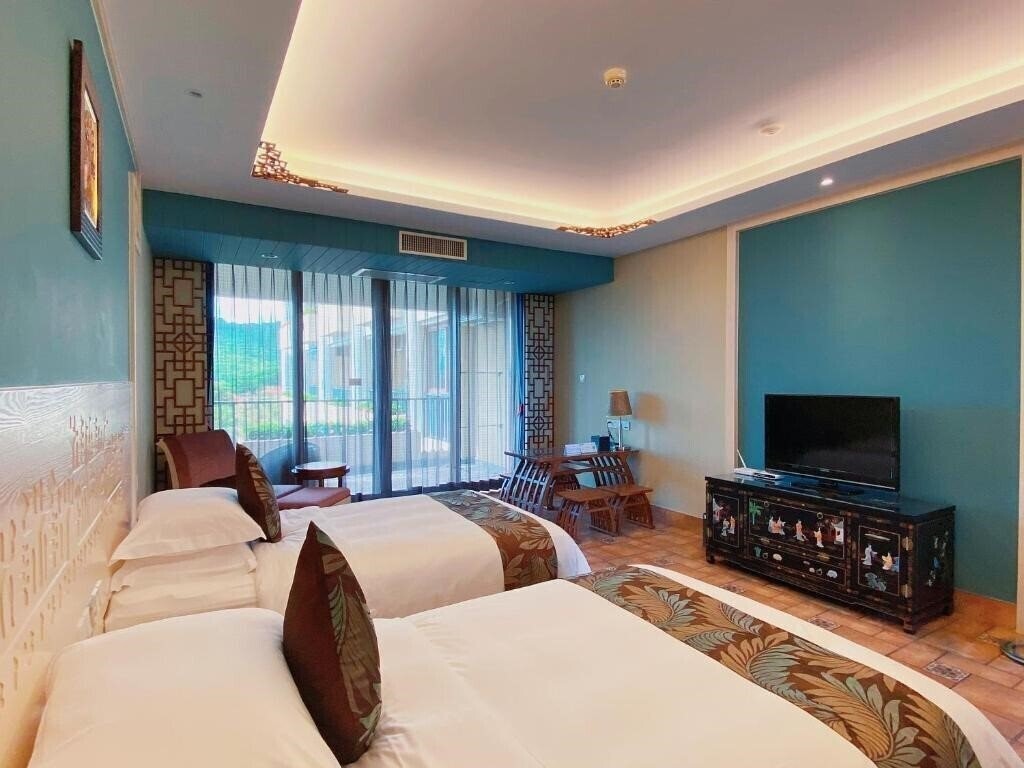 Фотографія Luhuitou State Guesthouse & Resort 3*