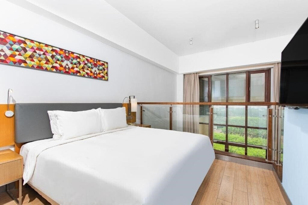 Фотография Holiday Inn Express Haikou West Coast 3*
