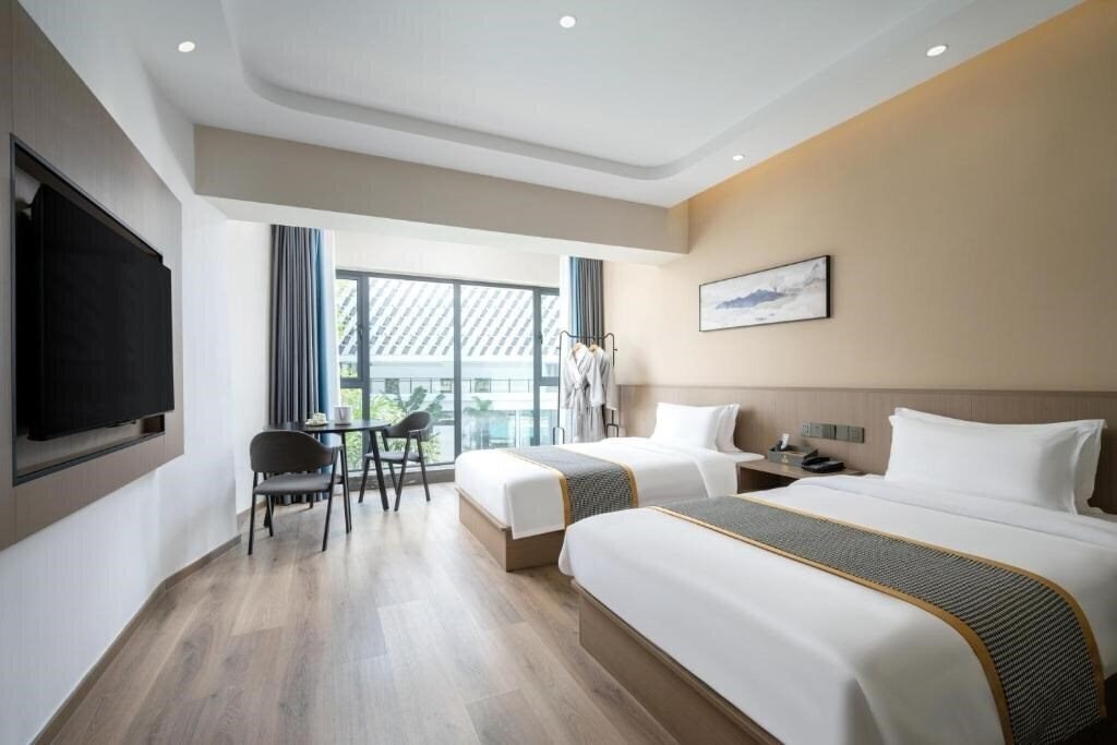 Фото Sanya Yalong Bay Xinya Hotel 4*