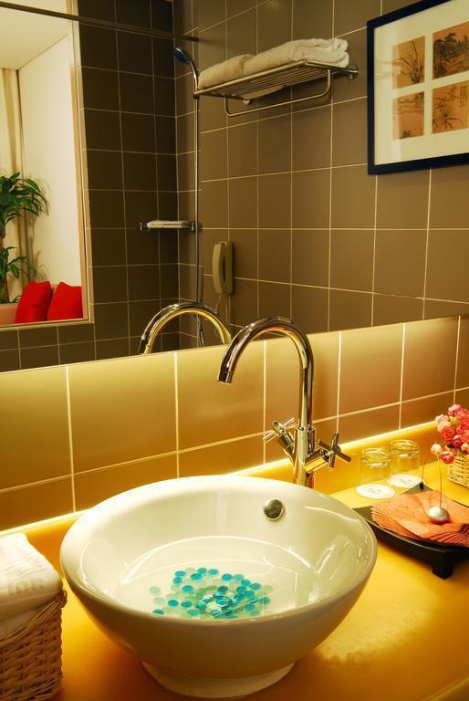 Фотографія Traveler Inn Huaqiao Beijing 3*