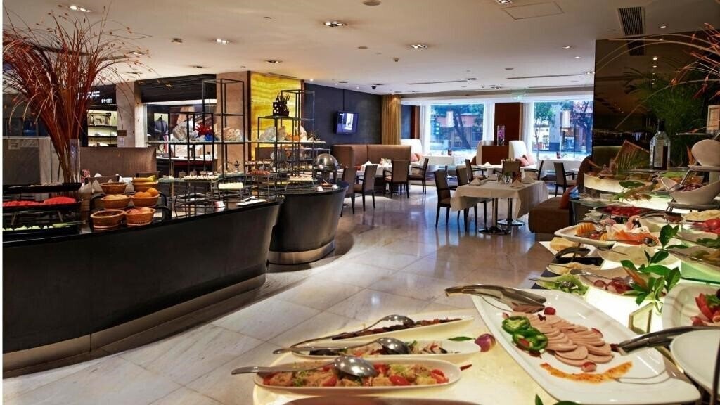Фотографія Guo Ji Yi Yuan Hotel 4*