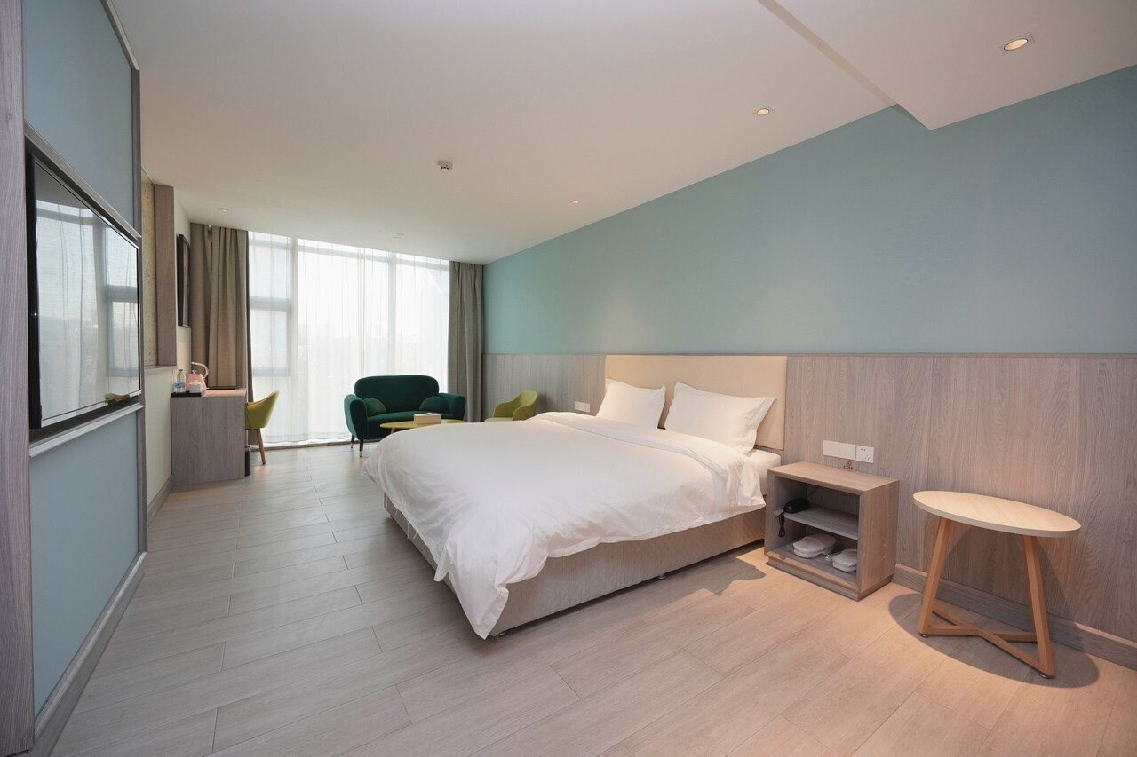 Изображение Shijia Boutique Hotel (Beijing Sanlitun Tuanjiehu Subway Station) 3*