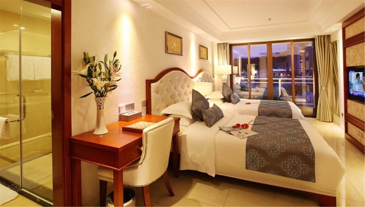 Фотографія T.E International Hotel 4*