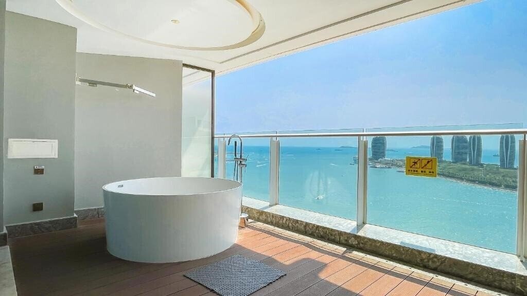 Фотографія Tiancheng Central Coast Seaview Hotel 5*