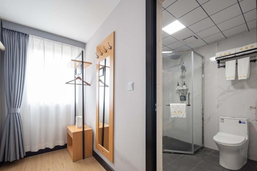 Фотографія Sanya Guanhailou Hotel 2*