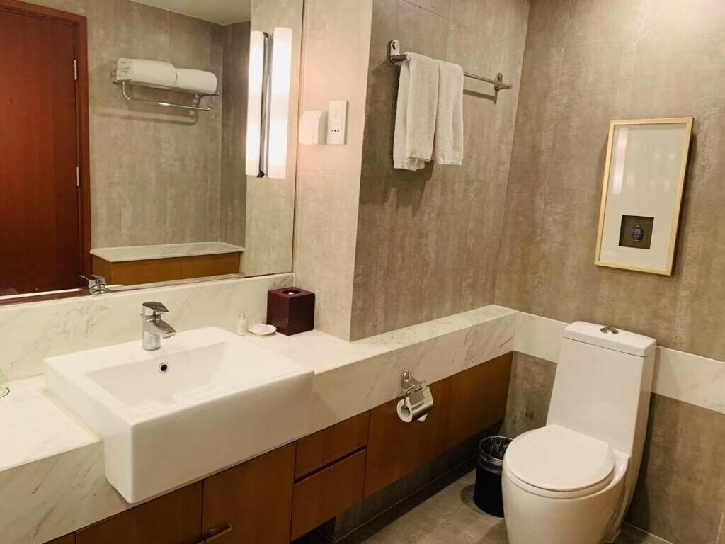 Фотография Oakwood Residence Shanghai 4*