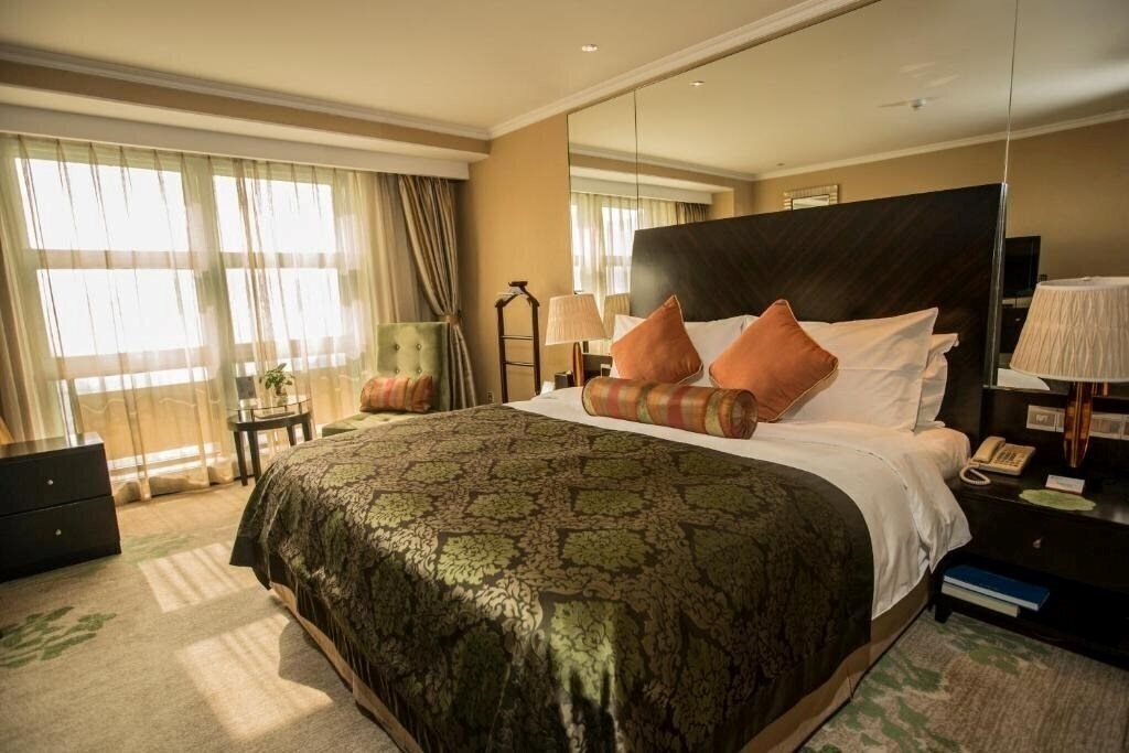 Готель Merry Hotel Shanghai 4*