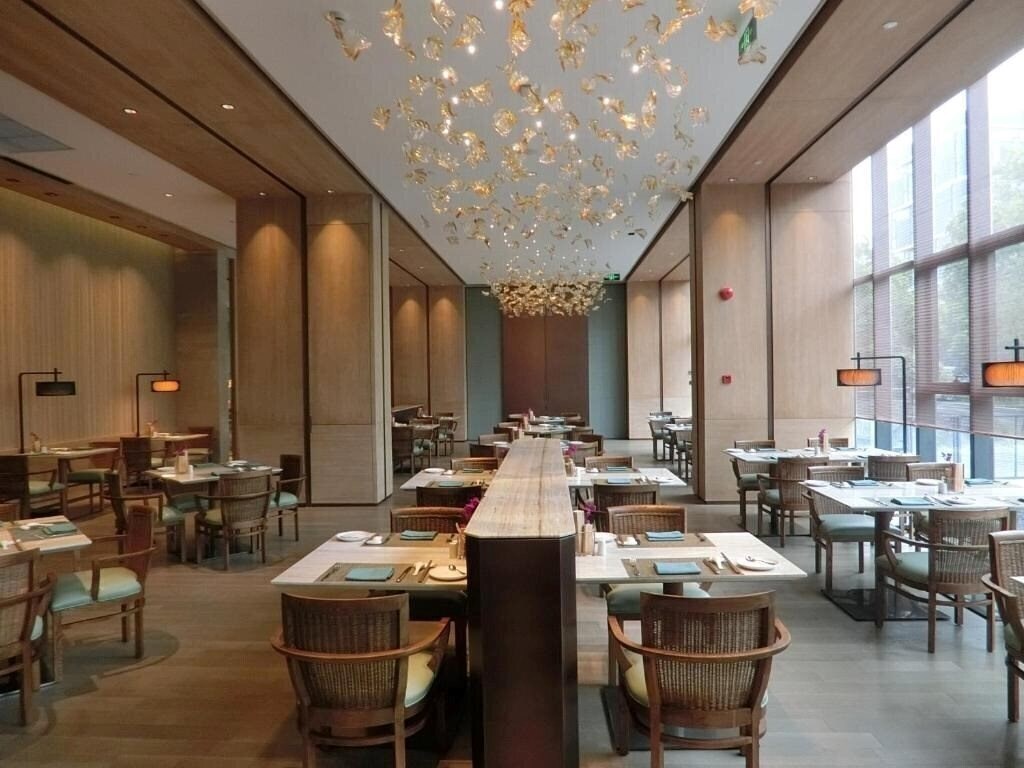 Отель Novotel Shanghai Clover 5*