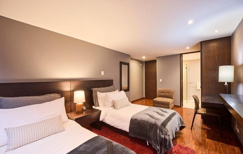 Фотографія Nico Apartasuites 4*