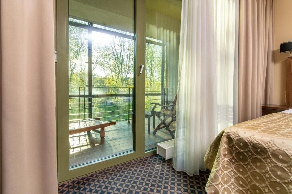 Фото Grand Spa Lietuva Hotel 4*
