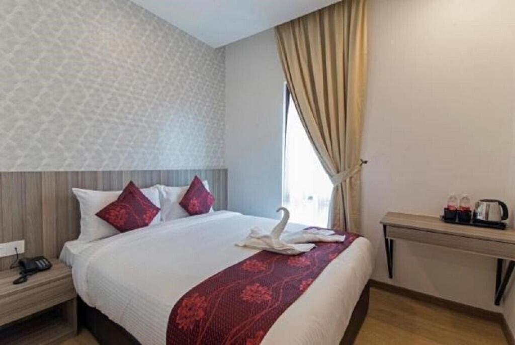 Фотографія Signature International Hotel China Town 3*