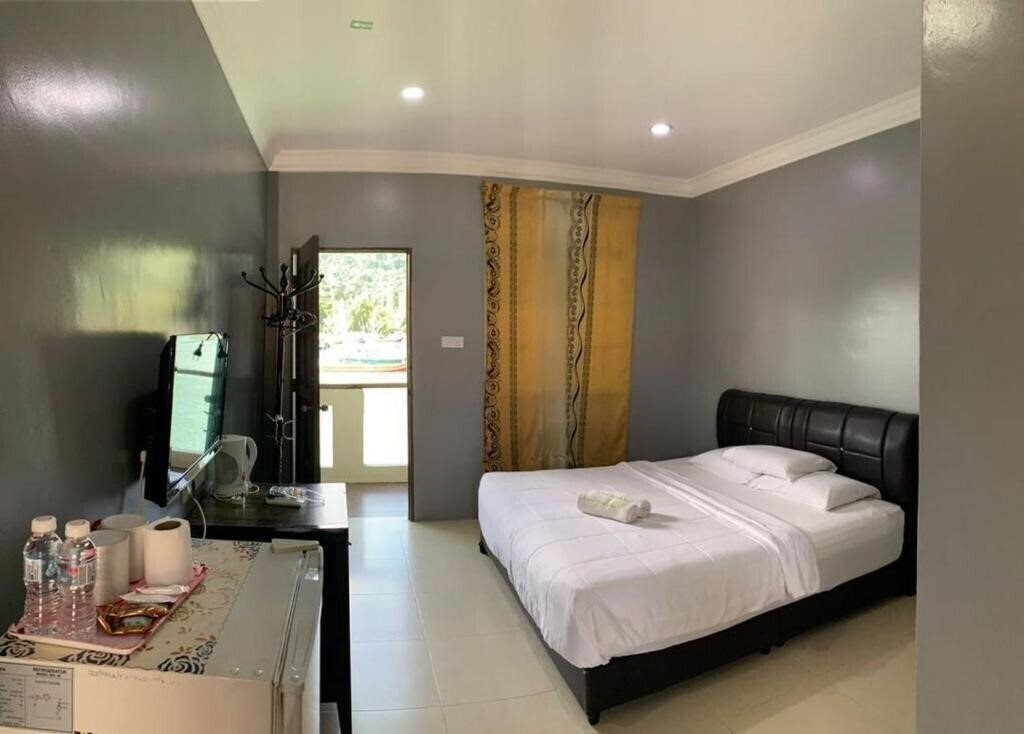 Фотография Penarak Bamboo Beach Motel 2*