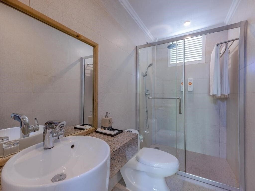 Фотографія Kaani Grand Seaview Guest House 3*