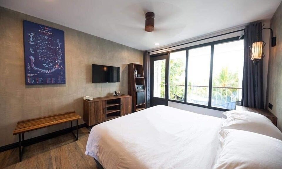 Фото Dhigurah Cottage 3*