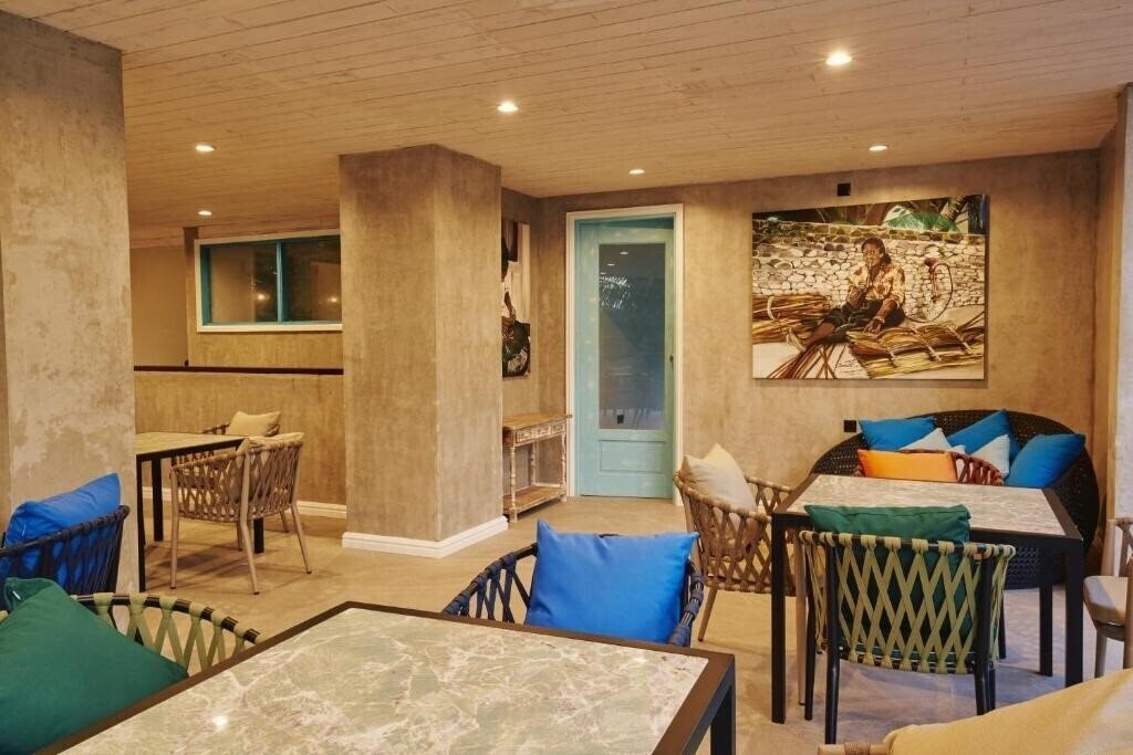 Фотография Beach Hotel Dhigurah Guest House 4*