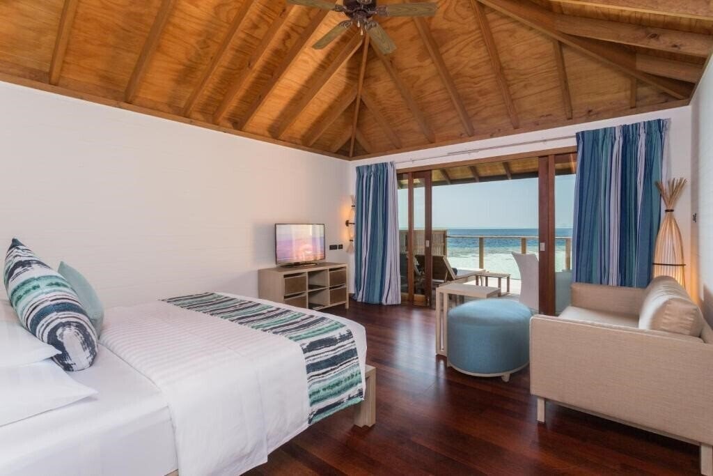 Фото Vilamendhoo Island Resort 4*