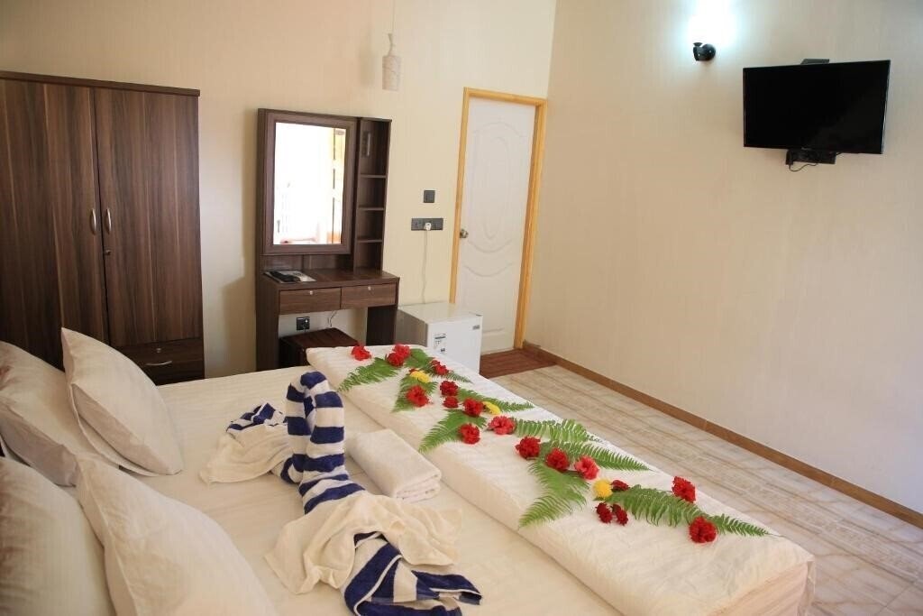 Фотография Evila Inn Thoddoo 3*