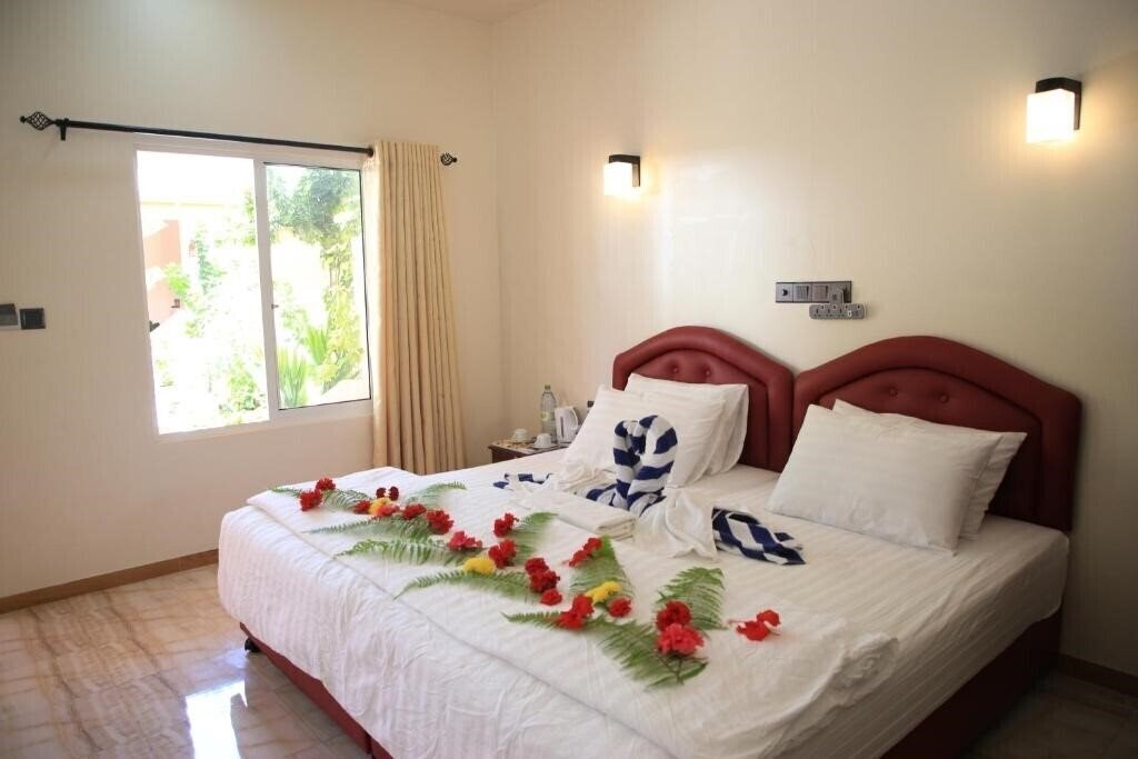 Изображение Evila Inn Thoddoo 3*