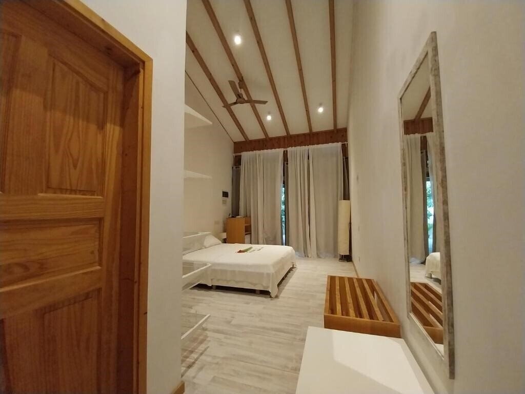 Изображение Origami Inn Himandhoo Guest House гостиный двор