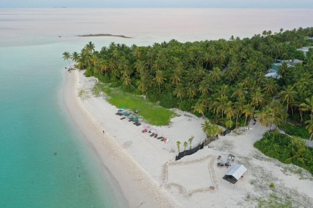 Картинка Origami Inn Himandhoo Guest House гостиный двор