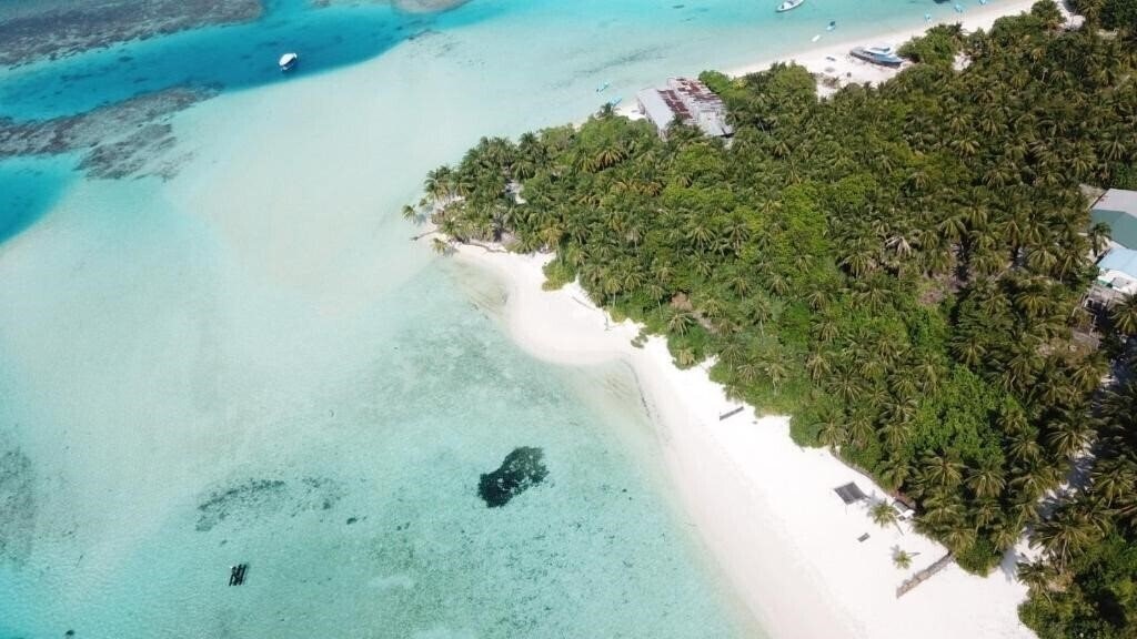 Отель Origami Inn Himandhoo Guest House гостиный двор