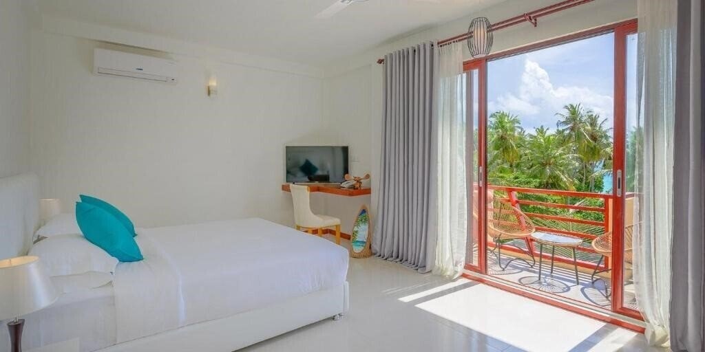 Фото White Sand Dhigurah Guest House гостиный двор