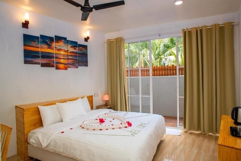 Фото Finolhu Inn Dhigurah Guest House гостиный двор