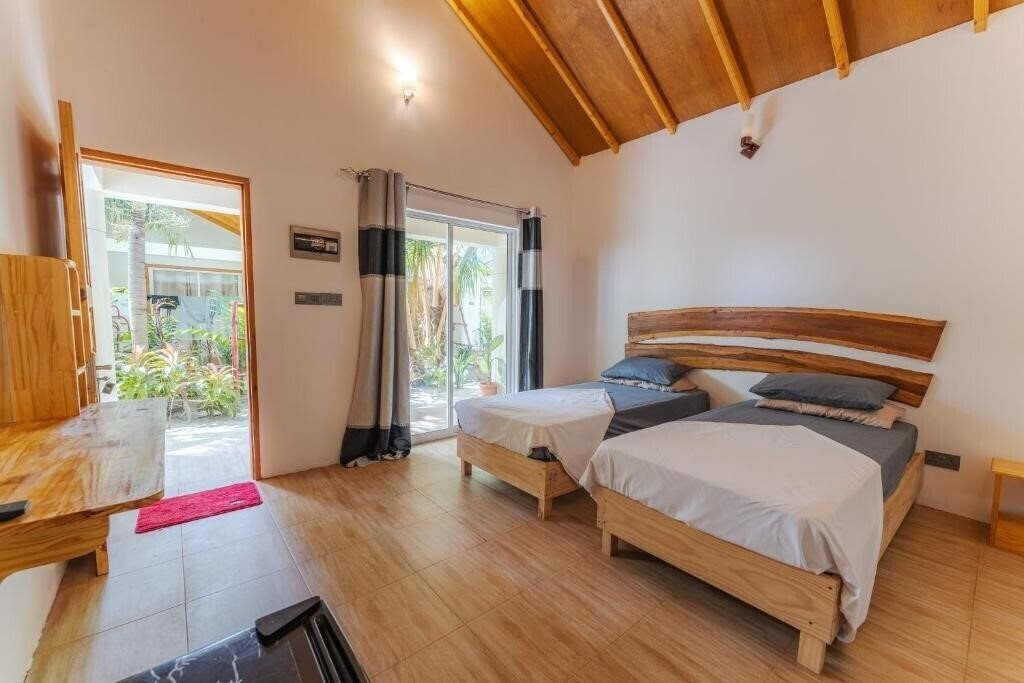 Фото Thoddoo Sun Sky Inn 3*