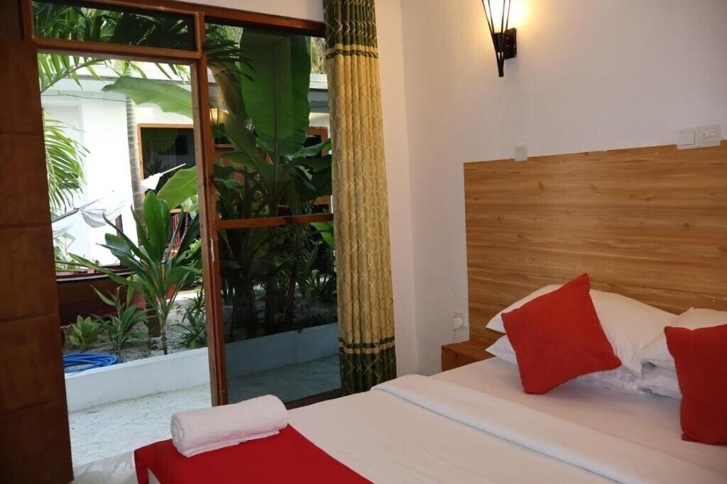 Фотографія Dhontakuru Guest House 3*