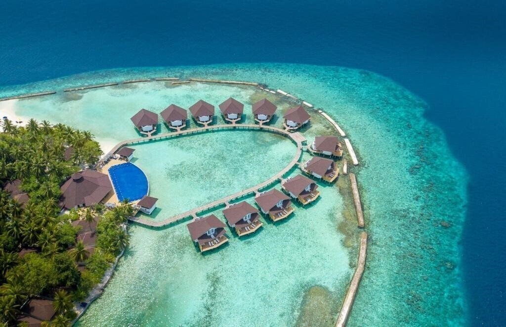 Отель Ellaidhoo Maldives by Cinnamon 4*