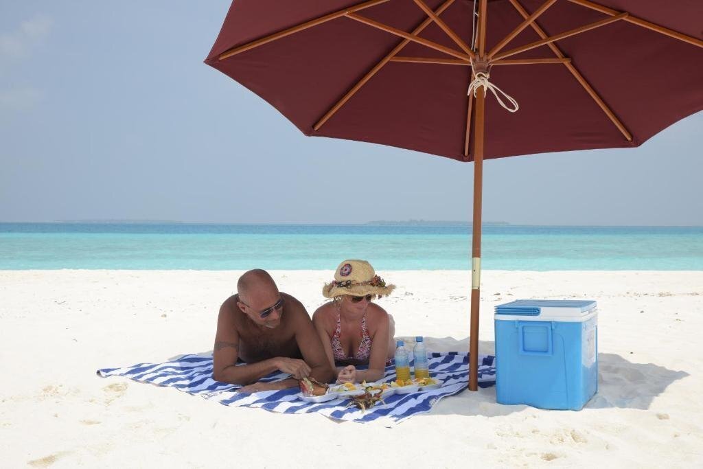 Фотографія Madi Finolhu Guest House гостиный двор